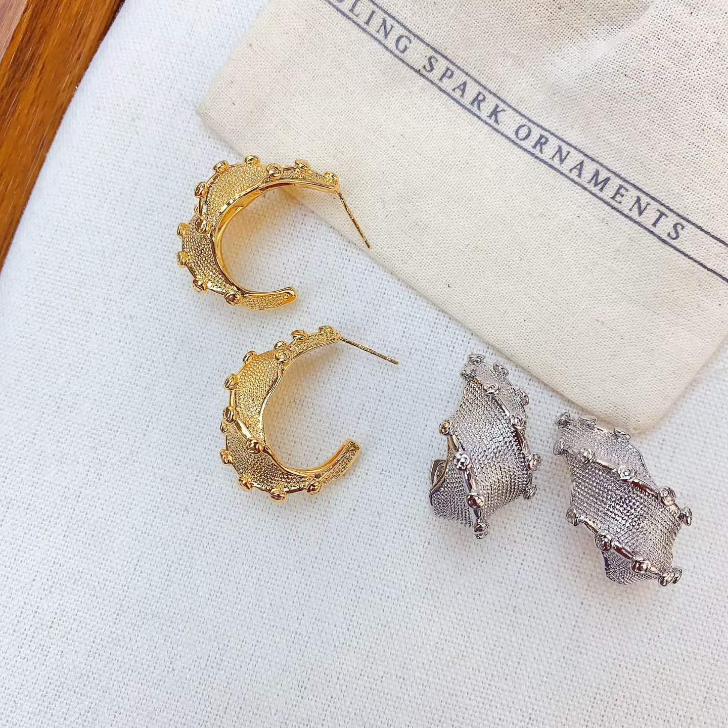 Anti-tarnish Korean hoop earrings Chennai Anti-tarnish gold and silver Korean hoop earrings from Gunjan Hair Clips Chennai